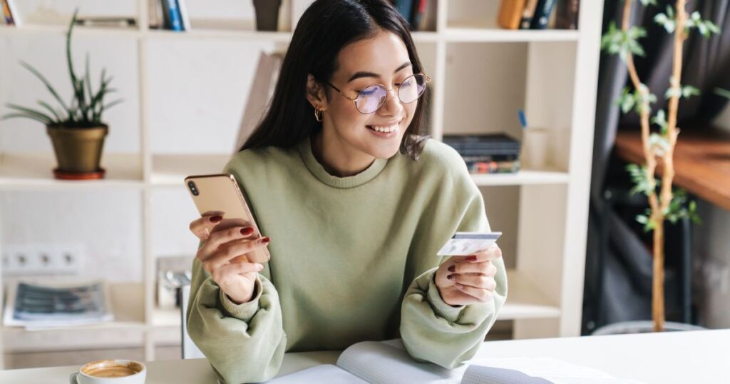 woman paying with credit card